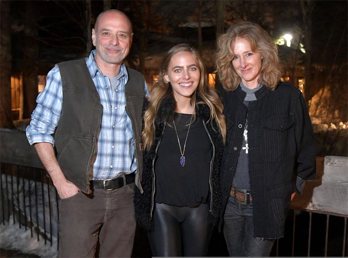 Shauna and her husband Eric taking a photo with Lauren Jenkins.